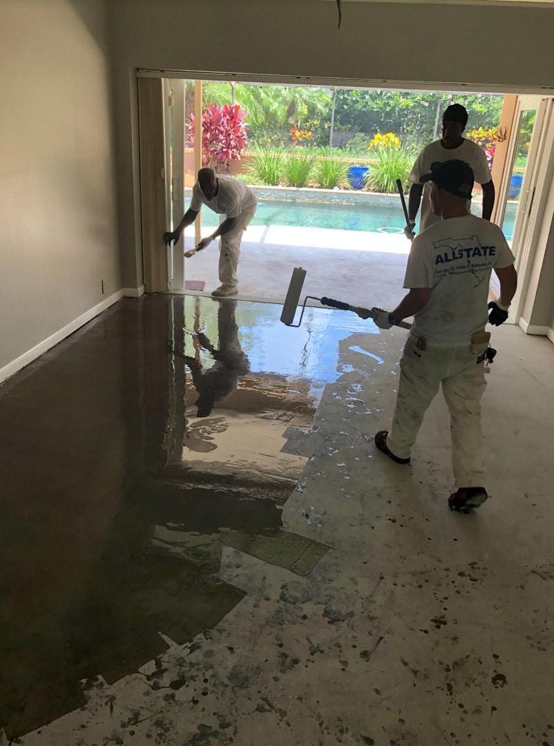 Workers Waterproofing A Slab In Safety Harbor Home